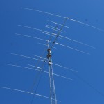 Jerimiah KD7DMP on top of Tower #1 with the 6 meter and 20 meter antennas installed